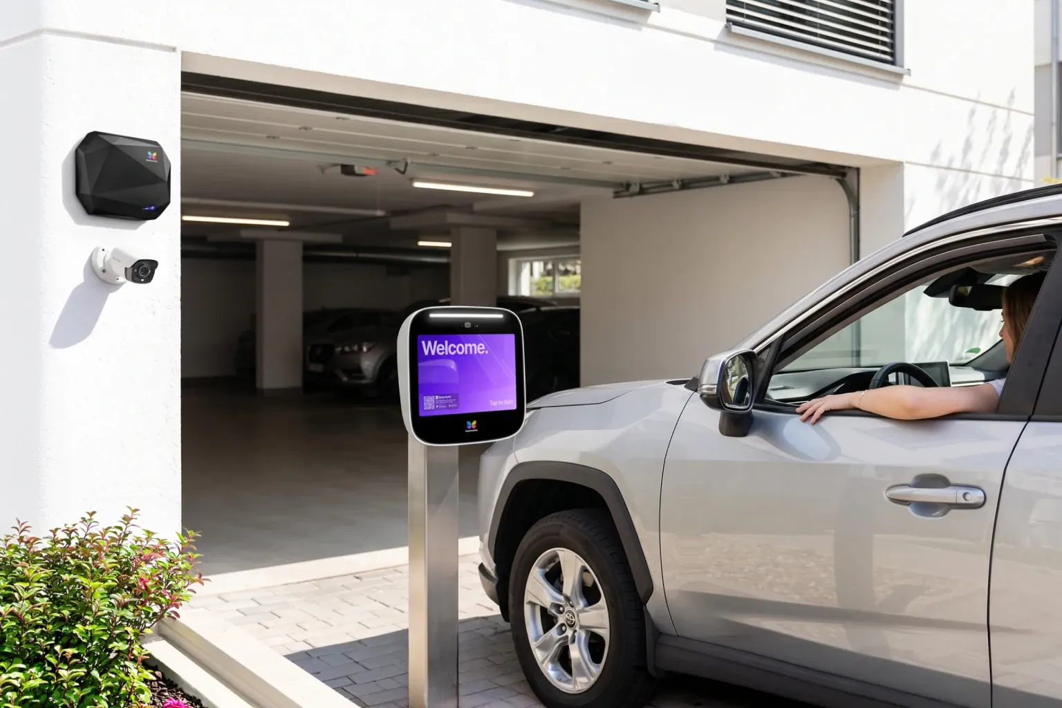 ButterflyMX intercom and vehicle reader at a parking garage entrance