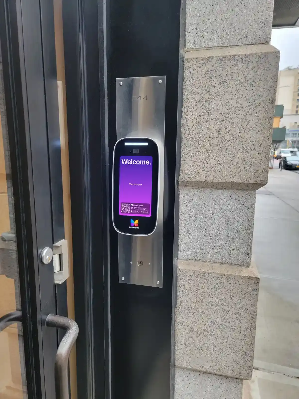 ButterflyMX 8-inch intercom beside an apartment door