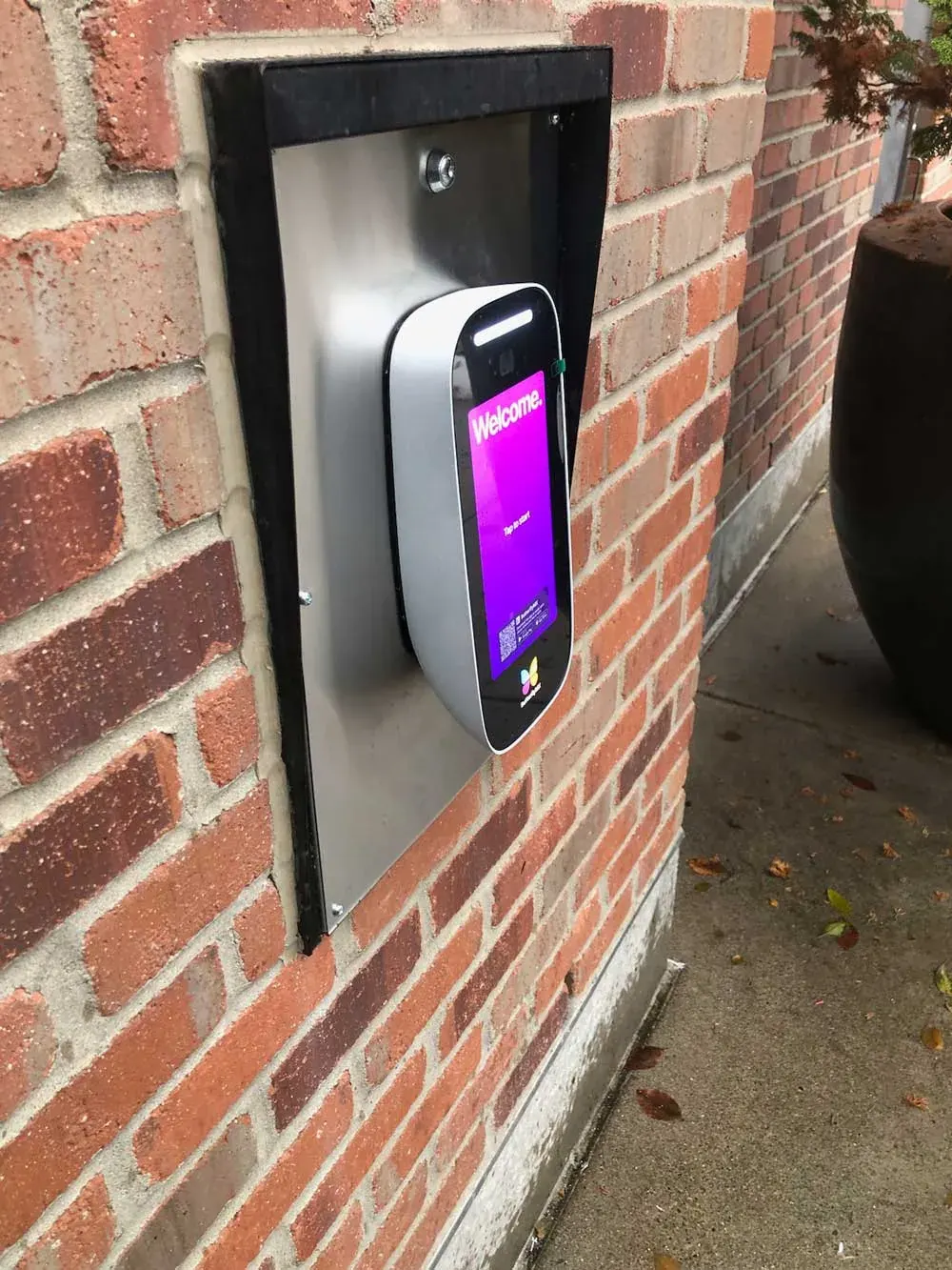 ButterflyMX intercom flush-mounted in brick