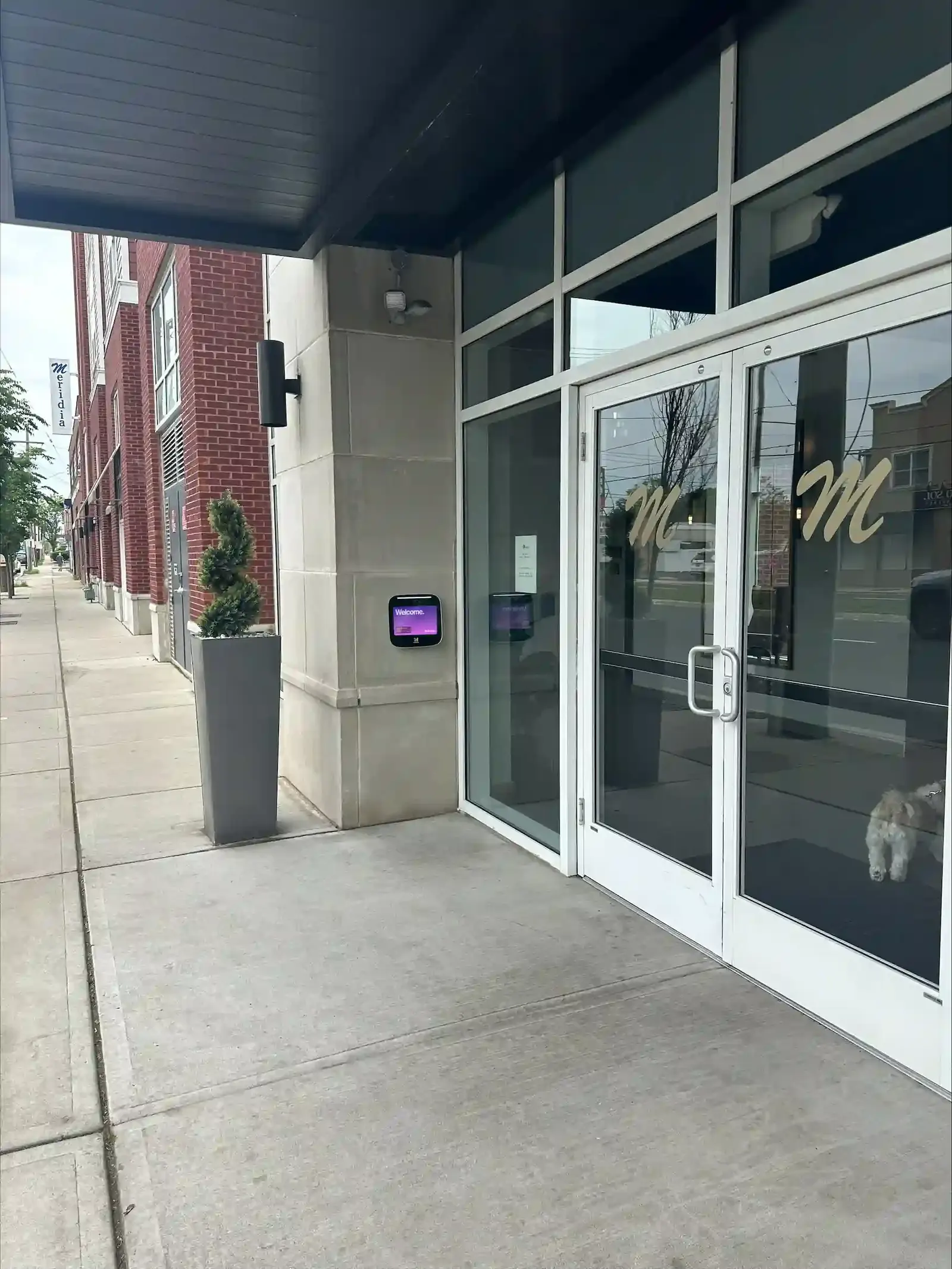 ButterflyMX 12-inch intercom at a new apartment building entrance